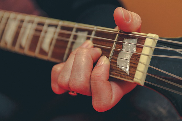 proper warmup on guitar helps you progress faster